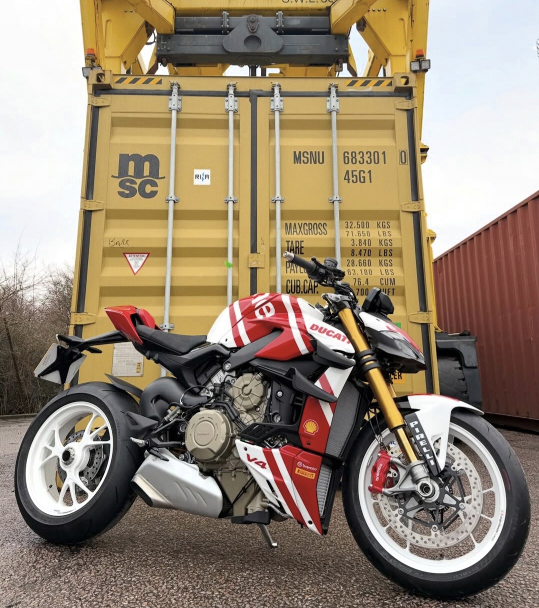 Motorcycle secured for collection and delivery